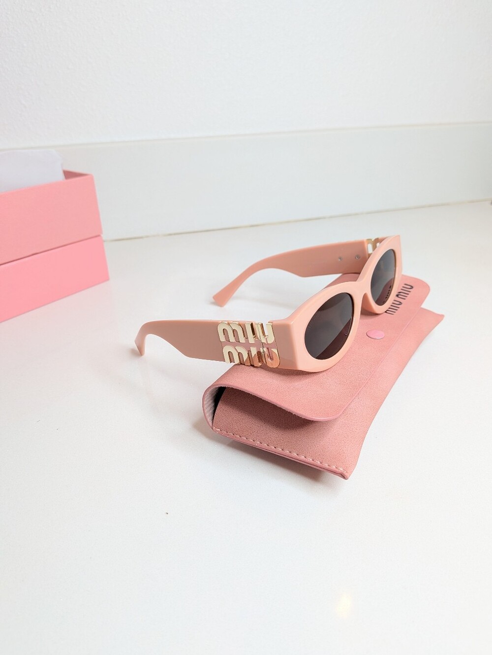 Miu Miu Pink Oval Sunglasses Gold Logo